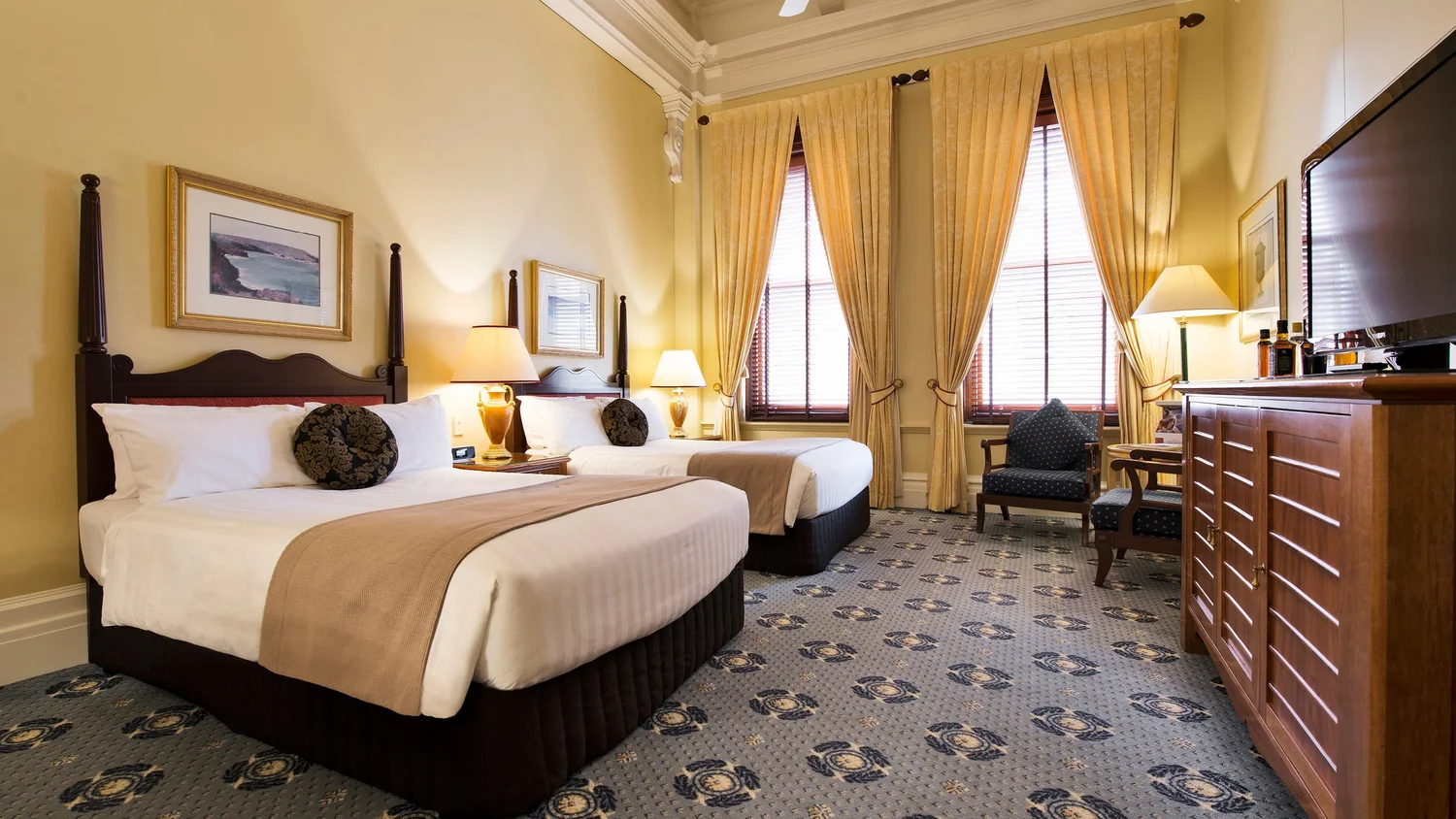 Deluxe Twin Room at Treasury Brisbane with two double beds